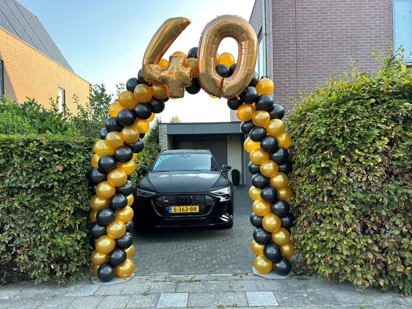 Foliecijfer Ballonnenboog, met foliecijfer in de top