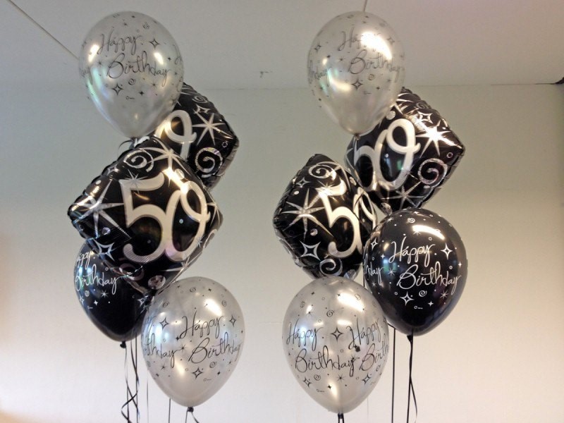 Jubileum heliumboeket, combinatie van bedrukte latex- en folieballonnen. Samenstelling kan in overleg voor uw gelegenheid worden aangepast.